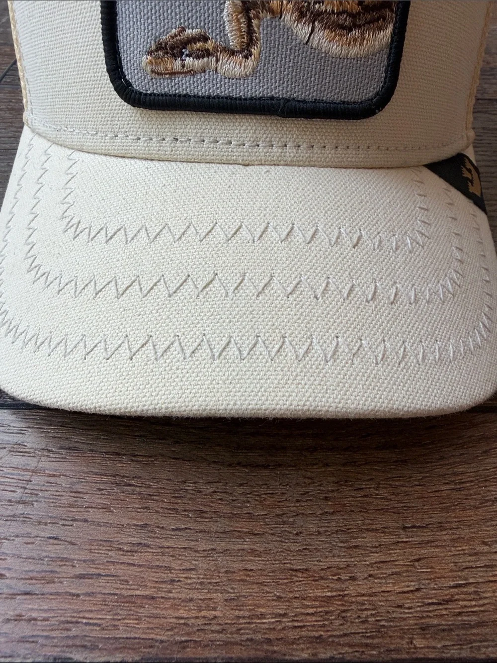 Goorin Bros Cream Trucker Hat with Brown Snake Patch